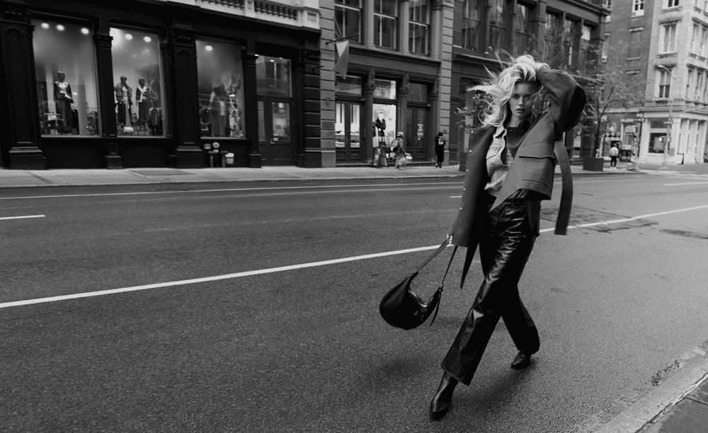 image of a female model walking in the street wearing rag and bone clothes