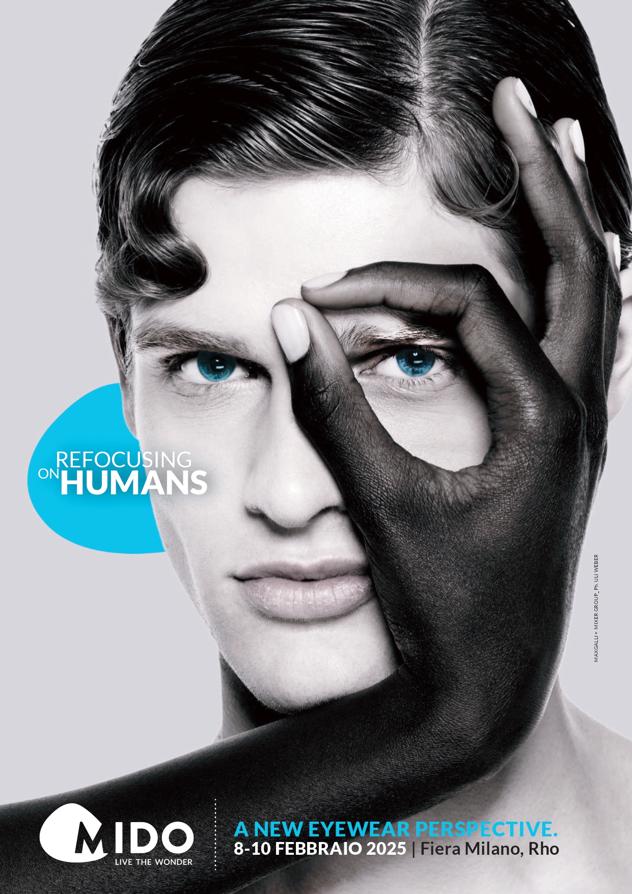 Promotional poster for MIDO eyewear trade show. It shows a man with blue eyes, with text 'REFOCUSING ON HUMANS' and 'A NEW EYEWEAR PERSPECTIVE. 8-10 FEBBRAIO 2025 | Fiera Milano, Rho'. 