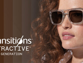 Woman wearing clear-framed sunglasses with brown tinted lenses, with text displaying 'Transitions XTRACTIVE New Generation' eyewear branding.