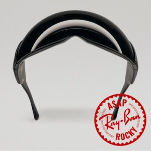 Front view of black Ray-Ban Ultra Wrap sunglasses showing the wraparound silhouette and wide lens design with A$AP Rocky Ray-Ban branding