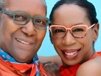Image of a man and woman wearing OGI eyewear and hugging