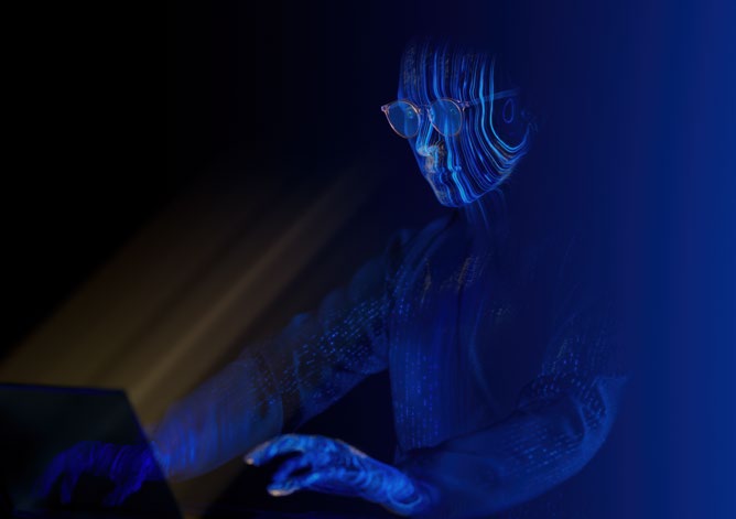 A 3D silhouette wearing a futuristic blue-tinted glasses in a dark, atmospheric setting. The image is bathed in deep blue lighting with dramatic shadows, creating a cyberpunk or sci-fi aesthetic. The person's face is partially obscured by the high-tech device.