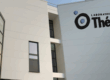 Building with Logo Laboratoires Thea on it