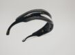 Ray-Ban Ultra Wrap 001 sunglasses with dramatic curved black frames and striped detailing, floating against a white background