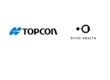 Two company logos displayed side by side on a light background - Topcon logo with blue geometric design on the left, and Okko Health logo with black circular elements on the right