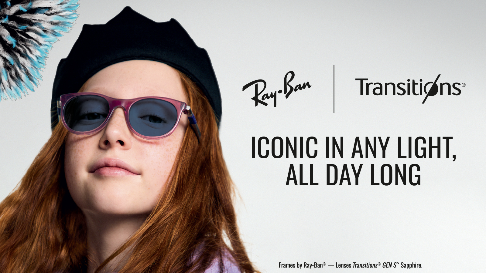 A young woman with long reddish-brown hair wearing a black beret and purple-framed Ray-Ban sunglasses with Transitions lenses. She's looking directly at the camera with a slight smile. The image includes the Ray-Ban and Transitions logos with text reading 'ICONIC IN ANY LIGHT, ALL DAY LONG' and 'Frames by Ray-Ban® — Lenses Transitions® GEN S™ Sapphire.