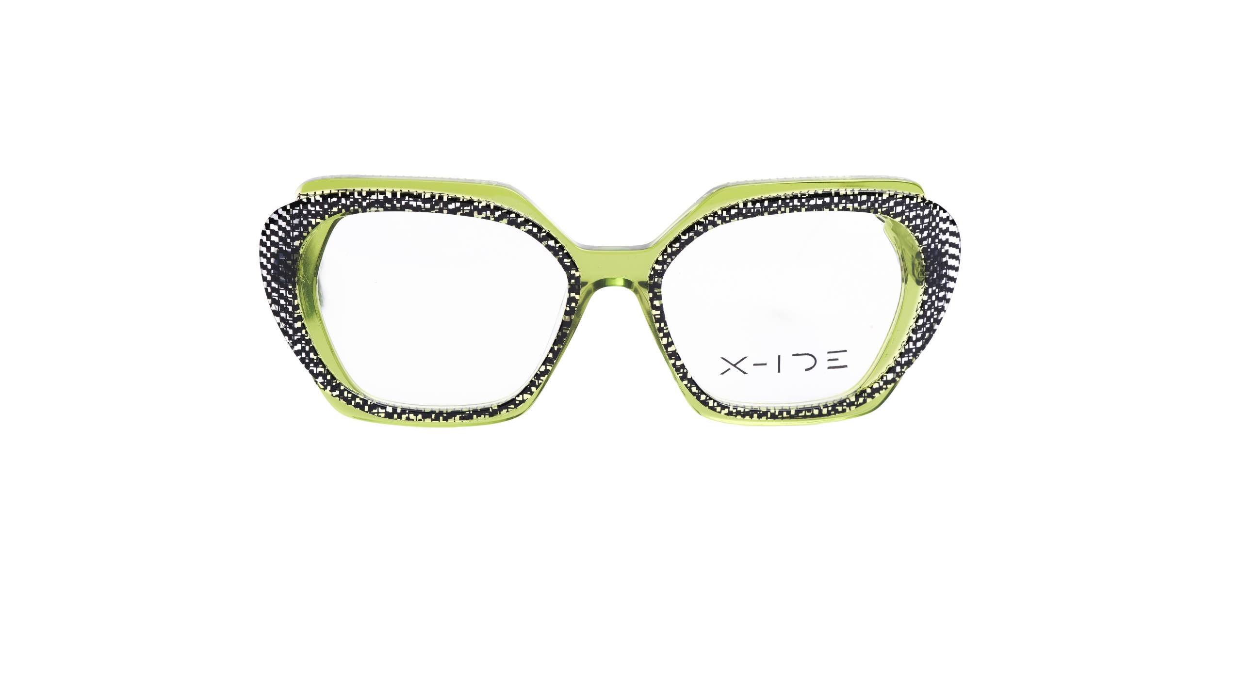 Oversized geometric eyeglasses in vibrant lime green with contrasting black and white houndstooth pattern detailing around the lens openings, from X-Ide New Generation collection