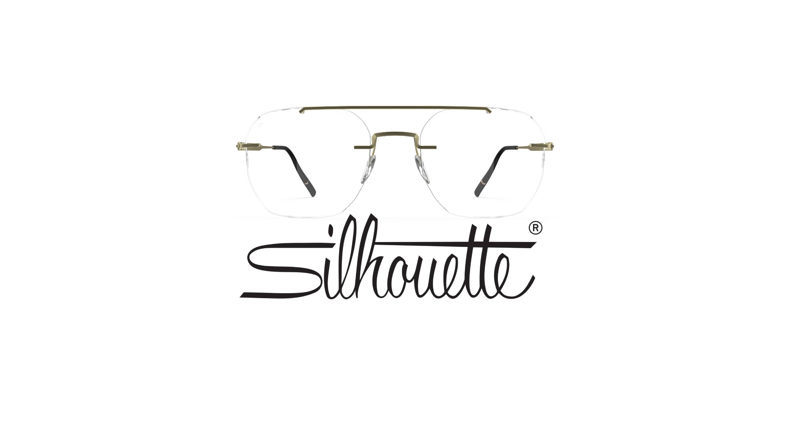 Front view of Silhouette Visionary rimless eyeglasses in bronze/gold titanium displayed above the elegant Silhouette script logo, emphasizing the ultra-flat lens surface and clean geometric design on a white background.