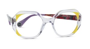 WOOW "Heart Queen" optical glasses with a clear transparent frame accented by yellow and purple color details, featuring an oversized geometric shape and "Heart" branding on the temple.