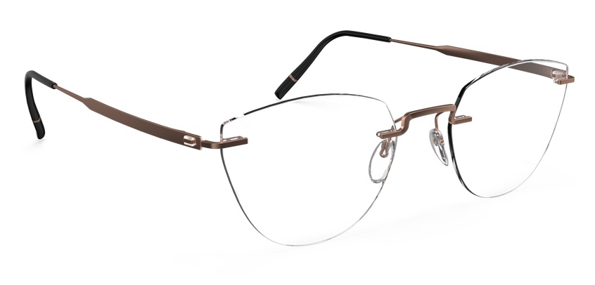 Lunettes sans monture Silhouette Visionary en titane bronze/doré avec une forme de verre inspirée des lunettes de chat, présentant le design minimaliste et le pont nasal architectural sous un angle latéral sur fond blanc.
