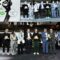 Cérémonie de remise des prix MIDO montrant un groupe de lauréats debout sur scène tenant des trophées dorés, avec un grand écran derrière eux affichant le branding de l'événement incluant les logos Best Store Award, Stand Up For Green 2025, CSE Award 2025, et MIDO aux côtés d'images de modèles portant des lunettes.