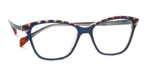 Modèle de lunettes William Morris ASCOT présentant une monture en acétate bleu marine avec motif écaille sur les branches. La monture a une forme rectangulaire classique avec des verres de démonstration transparents, mettant en valeur le design à motif de découpe diamant mentionné dans la description du produit.