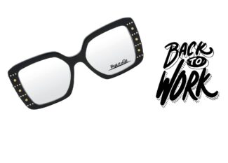 Black rectangular eyeglasses with gold studded details on the temples, featuring the "Back to Work" campaign branding French: Lunettes rectangulaires noires avec détails dorés cloutés sur les branches, présentant la campagne "Back to Work"