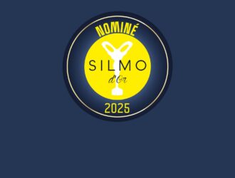 SILMO d'Or 2025 nominee badge featuring a circular yellow logo with white glasses icon and trophy symbol on a dark blue background. Text reads 'NOMINEE' at the top and '2025' at the bottom in yellow lettering