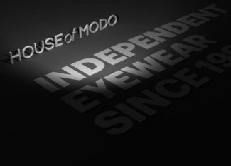 Three-dimensional House of Modo logo with the words Independence, Eyewear, Design and Storytelling on black background