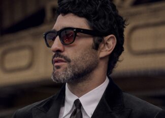Man wearing Brunello Cucinelli black acetate sunglasses with formal attire