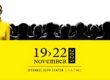 Model in yellow sunglasses and turtleneck standing out from crowd at SILMO Istanbul 2025, November 19-22