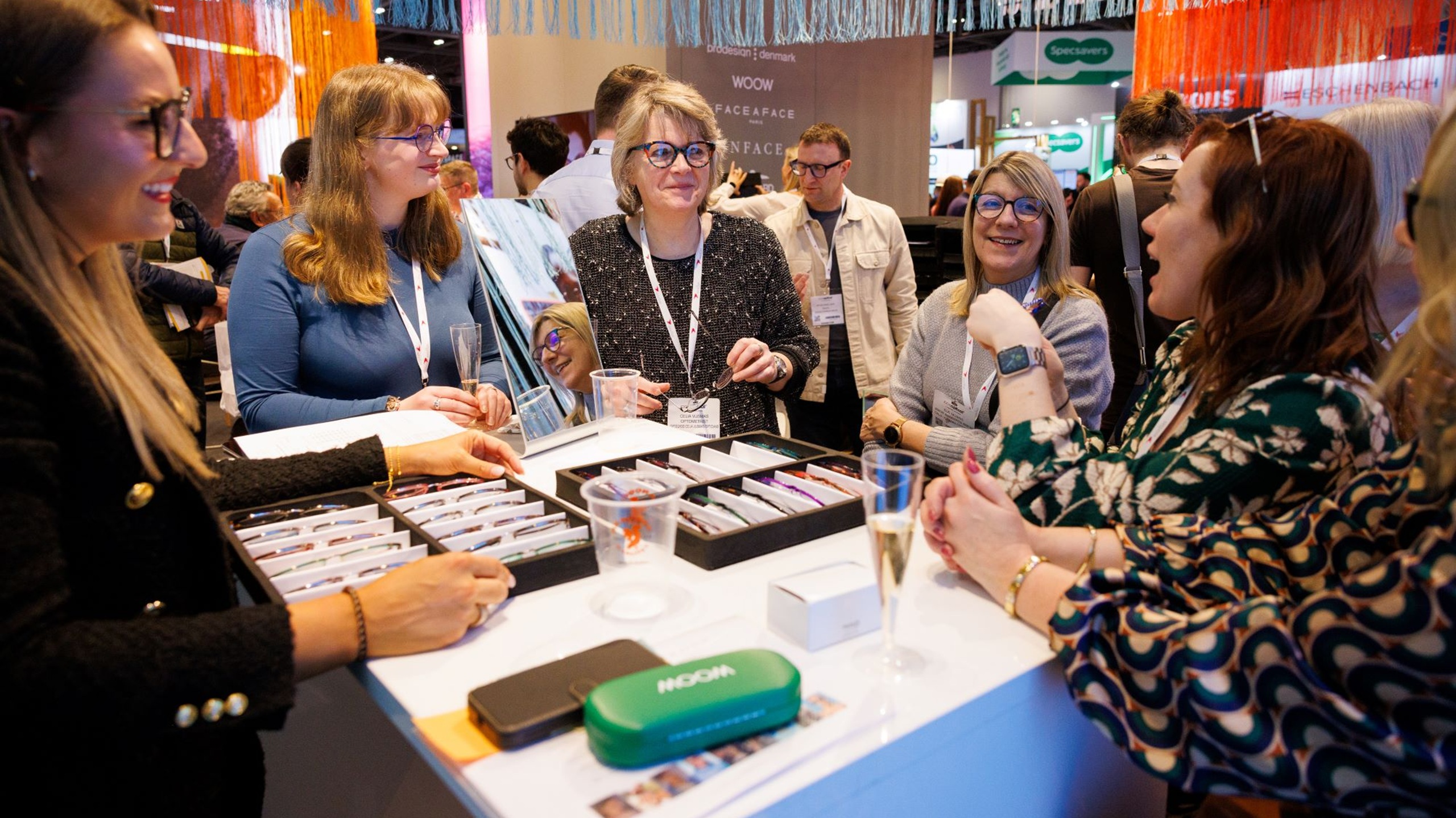 Networking and eyewear showcase at 100% Optical exhibition floor