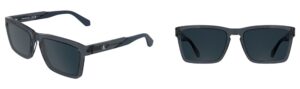 CKJ25617S sunglasses in transparent grey, rectangular acetate frame with CK monogram logo on temples.