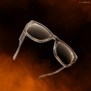 Ray-Ban Mega Wayfarer Rebel Alliance edition sunglasses in transparent light brown frames with matching brown lenses and starbird symbol detail on temple, floating against warm brown gradient background