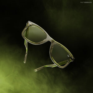 Ray-Ban Wayfarer Master Yoda edition sunglasses in transparent sage green frames with green lenses and Jedi Order insignia on temple, displayed against luminous green gradient background