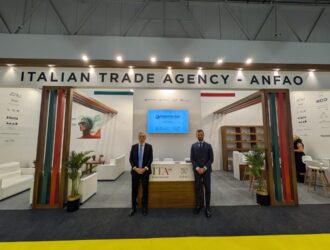 Two representatives stand at the Italian Trade Agency - ANFAO booth at Silmo Istanbul 2025