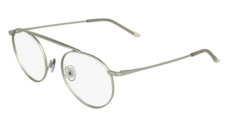 Un profil aux trois quarts des montures optiques Calvin Klein CK26105T, illustrant une face ronde sophistiquée en titane, rehaussée par une barre supérieure surélevée avec des détails découpés au laser et des manchons injectés élégants.