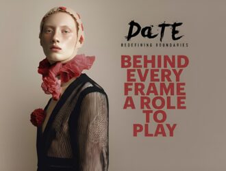 Promotional image for DaTE 2026 featuring a model in avant-garde attire with the tagline "Behind Every Frame a Role to Play."