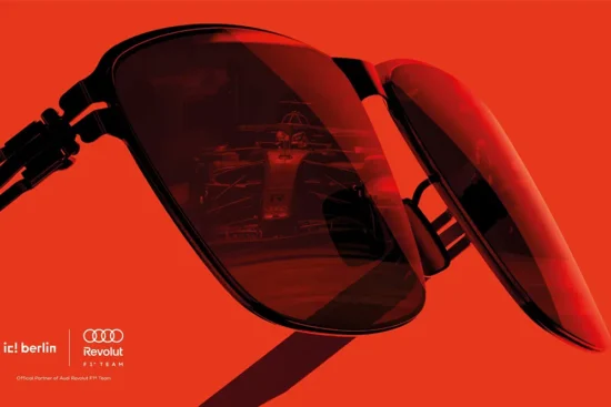 ic! berlin sunglasses reflecting Audi Revolut F1 Team race car on vibrant red background