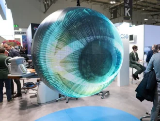Large illuminated eye sculpture at MIDO 2026 eyewear exhibition