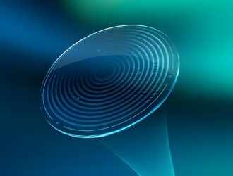 A digitally rendered eyeglass lens featuring concentric spiral rings, set against a blue and teal gradient background, representing the H.A.L.T.® MAX technology in Essilor® Stellest® 2.0 myopia management lenses.