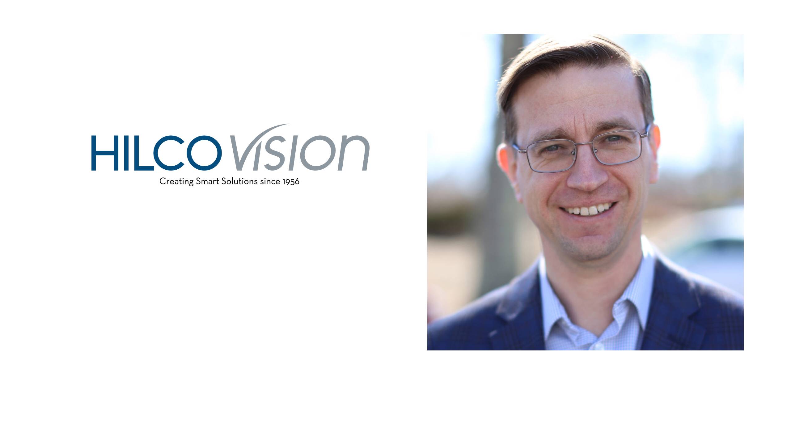 Logo de Hilco Vision accompagné d'un portrait de John Lakey