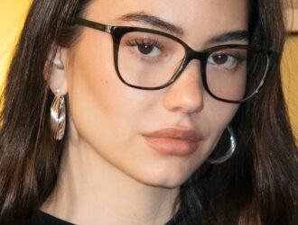 Woman wearing black rectangular eyeglasses