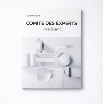 Couverture du Livre Blanc du Comité des Experts SILMO NEXT, avec une composition sculpturale minimaliste de formes géométriques blanches sur fond clair."
