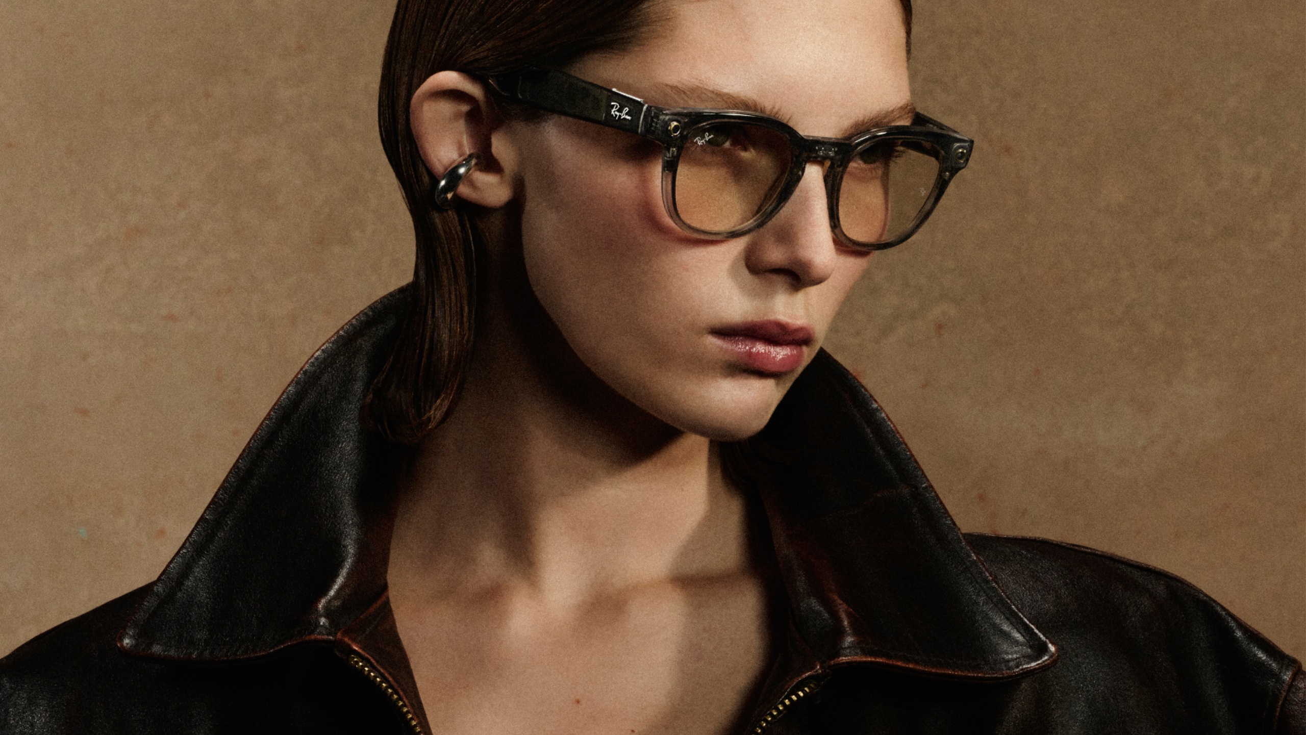 Model wearing Ray-Ban Meta Scriber Optics Gen 2 in Transparent Shiny Stone Beige