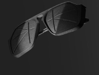 Zurich Collection sunglasses with geometric Inuit lenses on a dark background