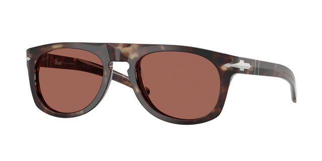 Lunettes de soleil Persol x Cassina en acétate écaille havane avec verres marron, dotées de surfaces fraisées le long du pont et des branches et d'une charnière flèche argentée — un détail inspiré du patrimoine design de Cassina.