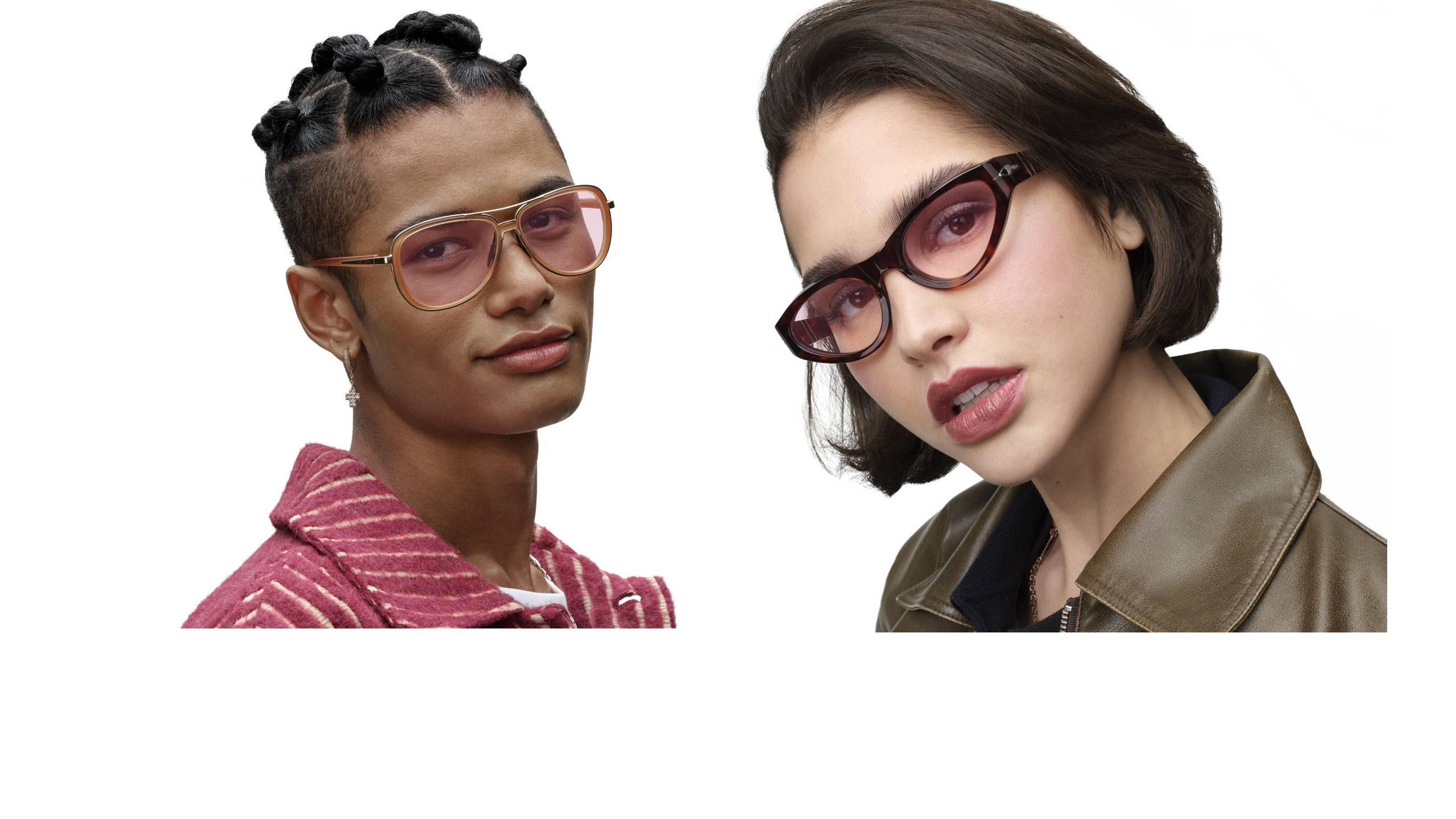 Two models wearing Transitions® Color Touch™ lenses in the Ruby color. Left model wears gold aviator frames with pink-rose tinted lenses and a striped pink jacket. Right model wears tortoiseshell cat-eye frames with rose-gradient lenses and an olive leather jacket.