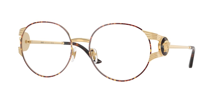 Versace VE1320 optical glasses featuring large, thin round rims with a dark tortoiseshell pattern. The gold-tone metal temples feature a distinctive ribbed "tie-clip" design and a circular black emblem with a raised gold Medusa head