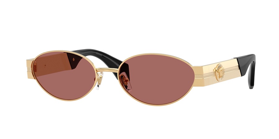 Versace VE2301 sunglasses with a narrow, gold-toned metal almond-shaped frame and rose-tinted lenses. The statement temples are thick gold metal with a horizontal grooved texture, a black ear rest, and a prominent gold Medusa head emblem.