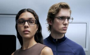 Close-up of two models: the woman wears narrow rectangular optical frames, and the man wears double-bridge pilot-style optical glasses.