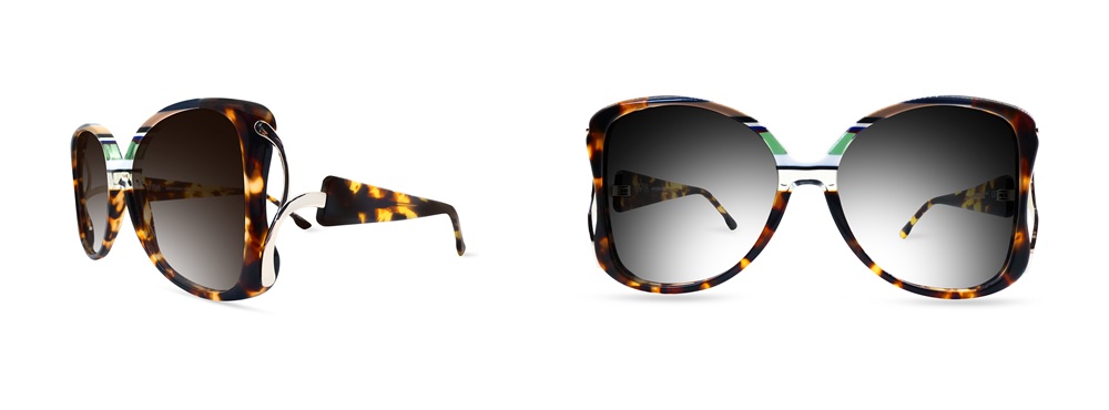 Lunettes de soleil Ultra Limited Carloforte en acétate écaille de tortue foncée avec insertions contrastées en vert et marine le long du profil supérieur et du pont, accent de branches en métal argenté et verres brun-gris dégradés. Présentées de profil et de face sur fond blanc.