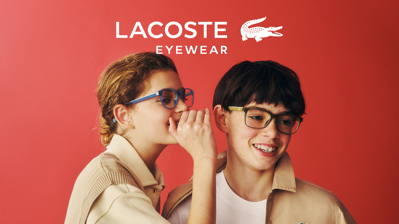 Two children wearing Lacoste eyewear against a red background, Lacoste Eyewear SS26 Kids & Tweens campaign
