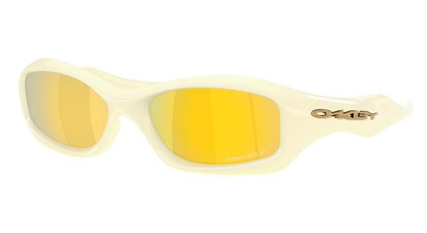 A side profile of the Oakley MUZM FatCat in "Cream," featuring a sculpted off-white frame and vibrant gold Prizm 24K Polarized lenses.