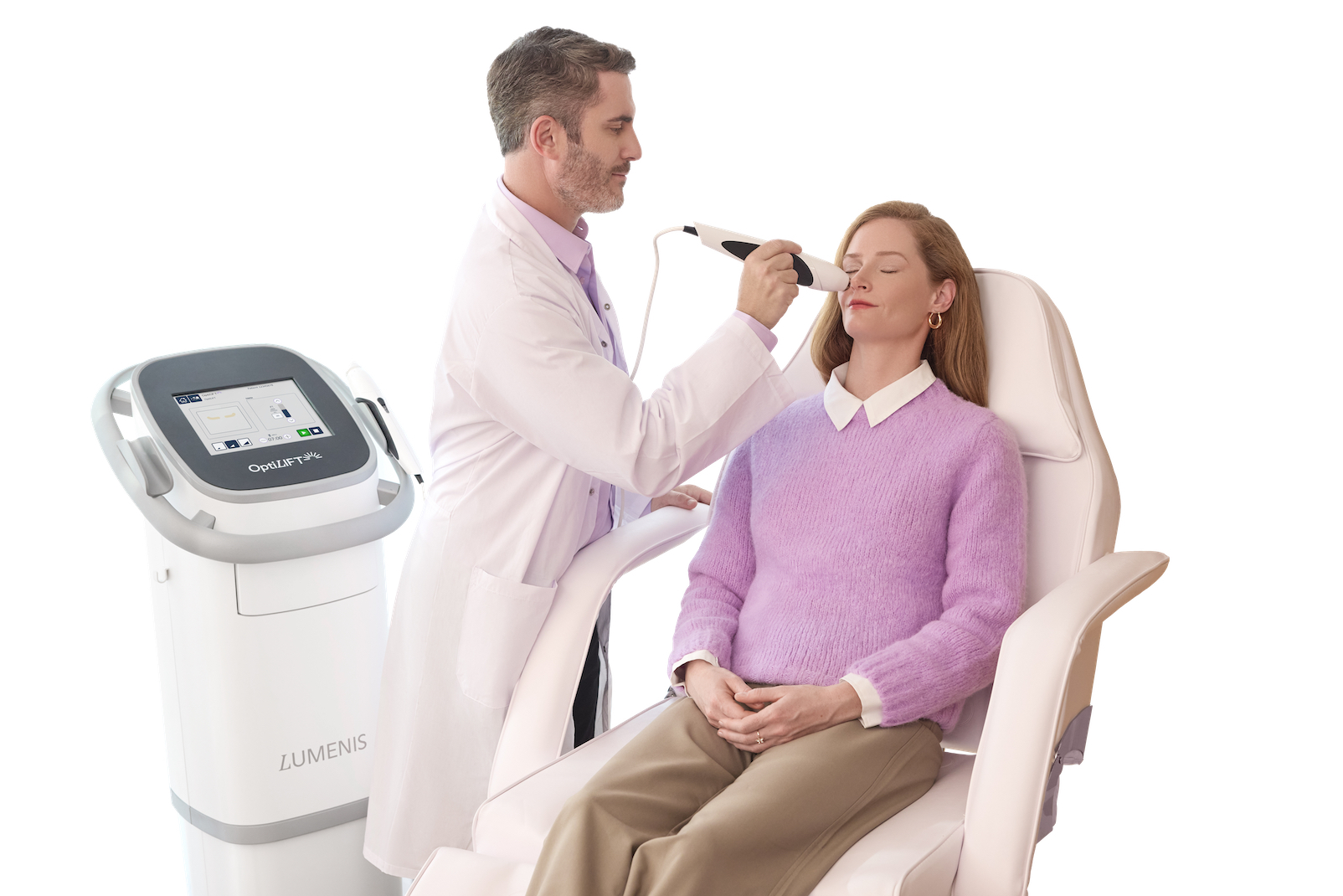 A clinician in a white coat uses the Lumenis OptiLIFT handheld applicator around the eye area of a seated female patient in a clinical setting, with the OptiLIFT console visible in the background.