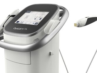 Close-up of the Lumenis OptiLIFT device console showing its touchscreen interface and control panel, with the DMSt handheld applicator and its gold-tipped treatment head displayed alongside.