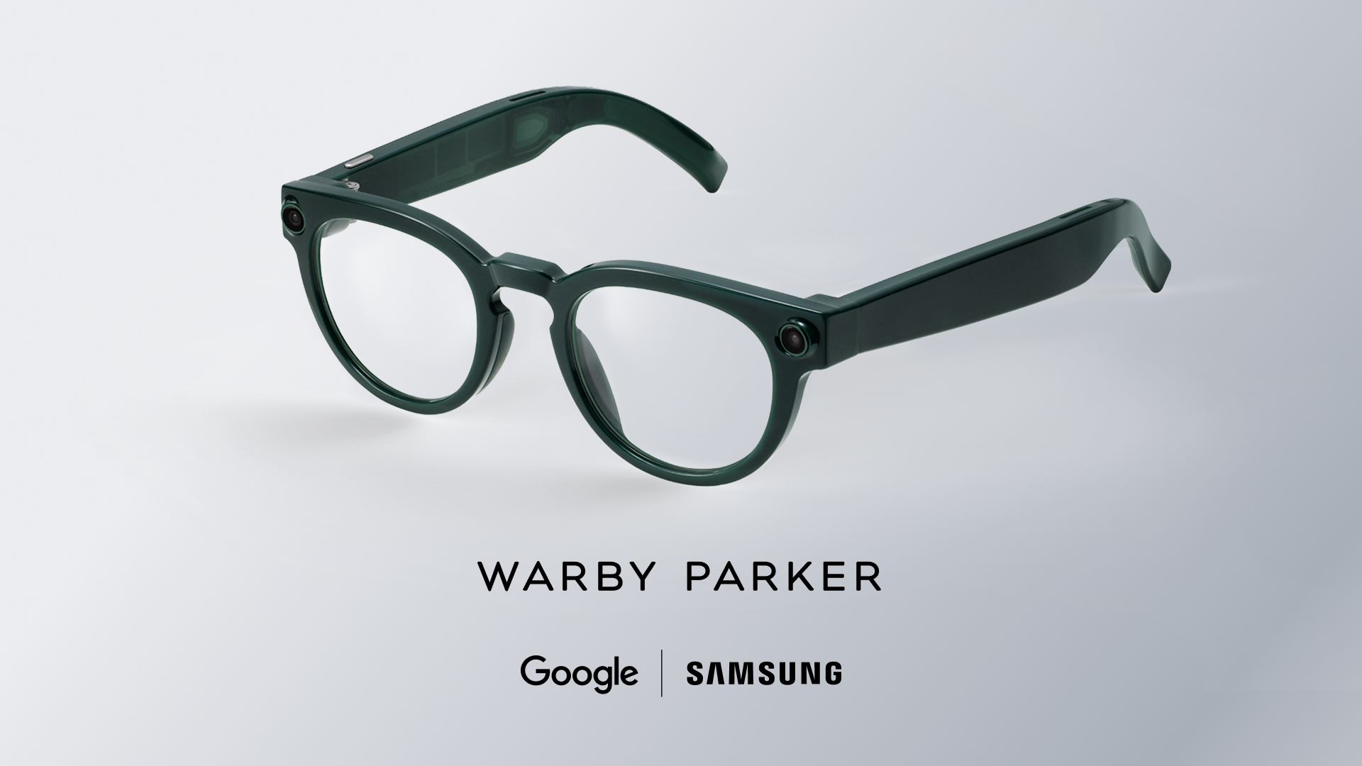 Dark green round smart glasses by Warby Parker shown in a studio render, featuring integrated cameras and AI-powered functionality created with Google and Samsung.