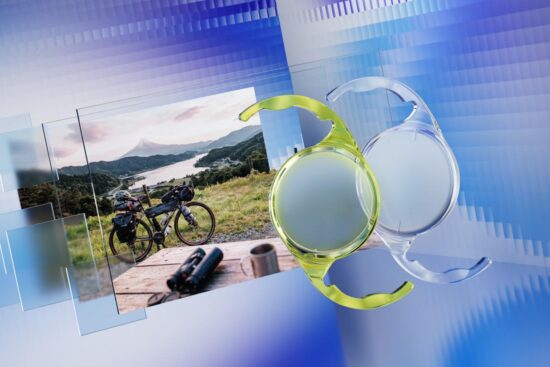 A promotional graphic for the ZEISS AT LUCIA toric 721P intraocular lens. Two transparent medical lenses (one clear, one with a yellow tint) are shown floating on the right. On the left, a framed photograph displays a scenic outdoor landscape featuring a bicycle parked on a hill overlooking a lake and a mountain peak, all set against an abstract blue textured background.