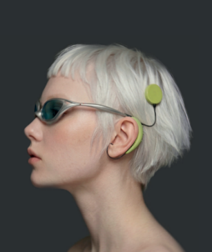 Model wearing tinted sunglasses paired with a green circular bone-conduction audio attachment.