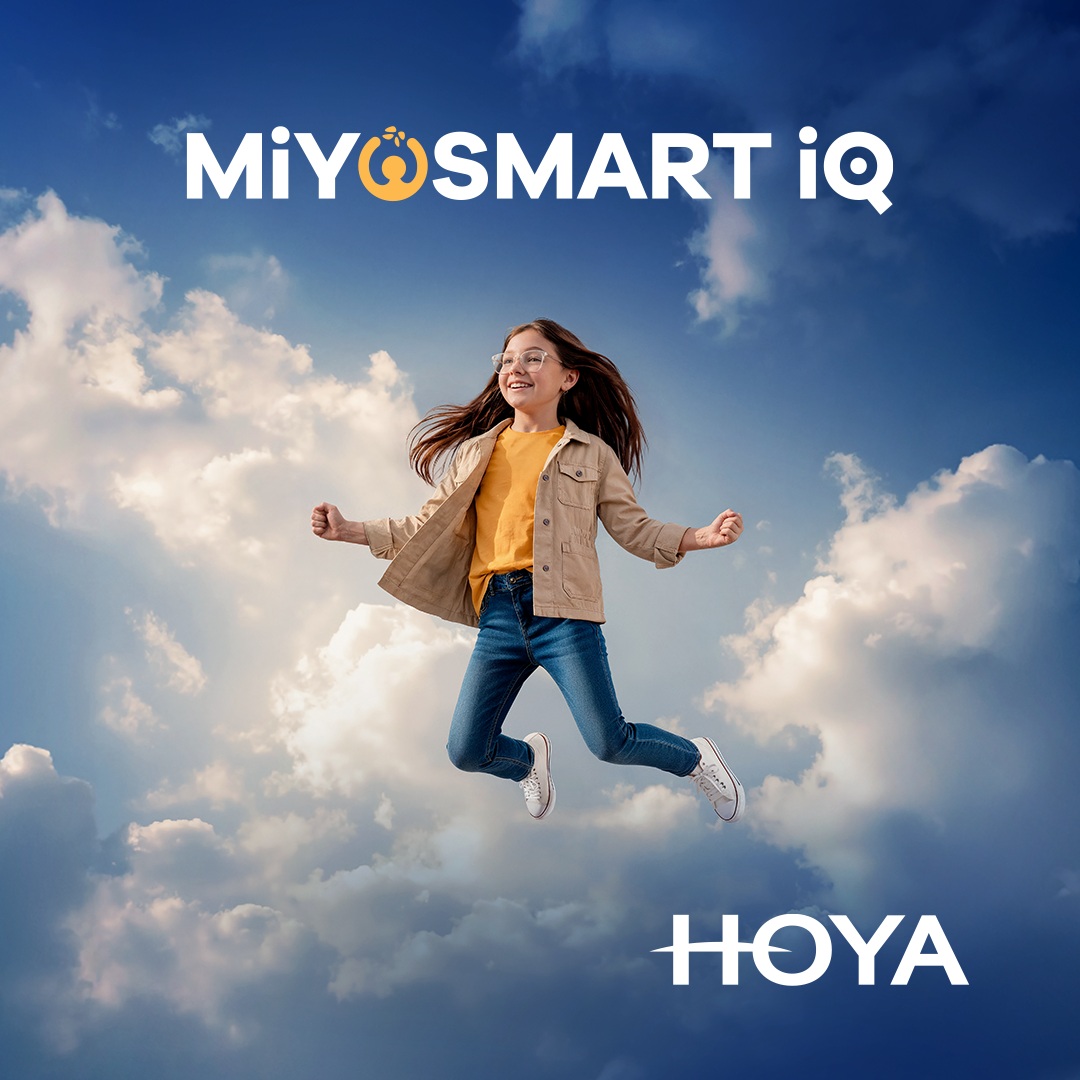 A girl in glasses jumps mid-air against a bright, cloud-filled blue sky, with the MiYOSMART iQ and HOYA logos.